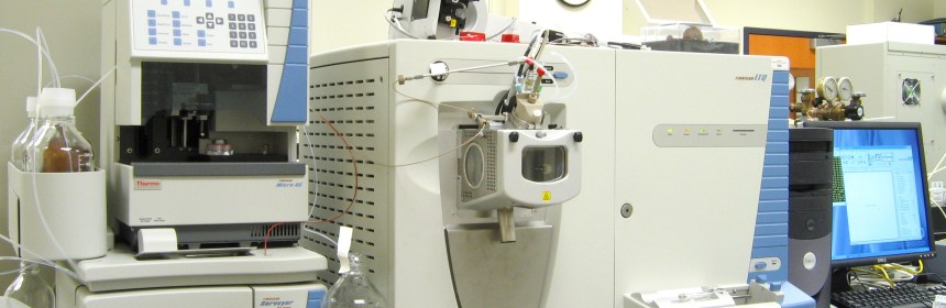 A collection of large diagnostic machines in a lab.